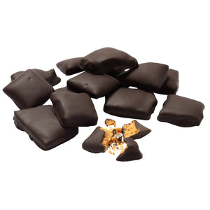 3oz pile of chocolate covered honeycomb candy pieces with one piece broken open to expose honeycomb candy inside.