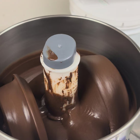 Ginding sesame toffee brittle in machine