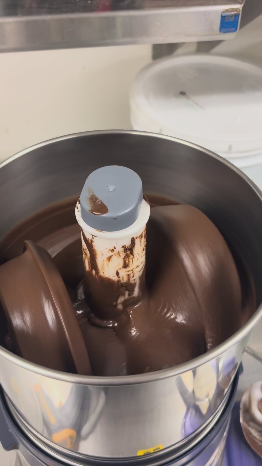 Ginding sesame toffee brittle in machine