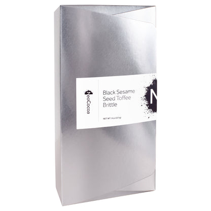 2 dimensional silver rectangle angle of closed 8oz box with title of “Black Sesame Seed Toffee Brittle” and a black NeoCocoa logo.