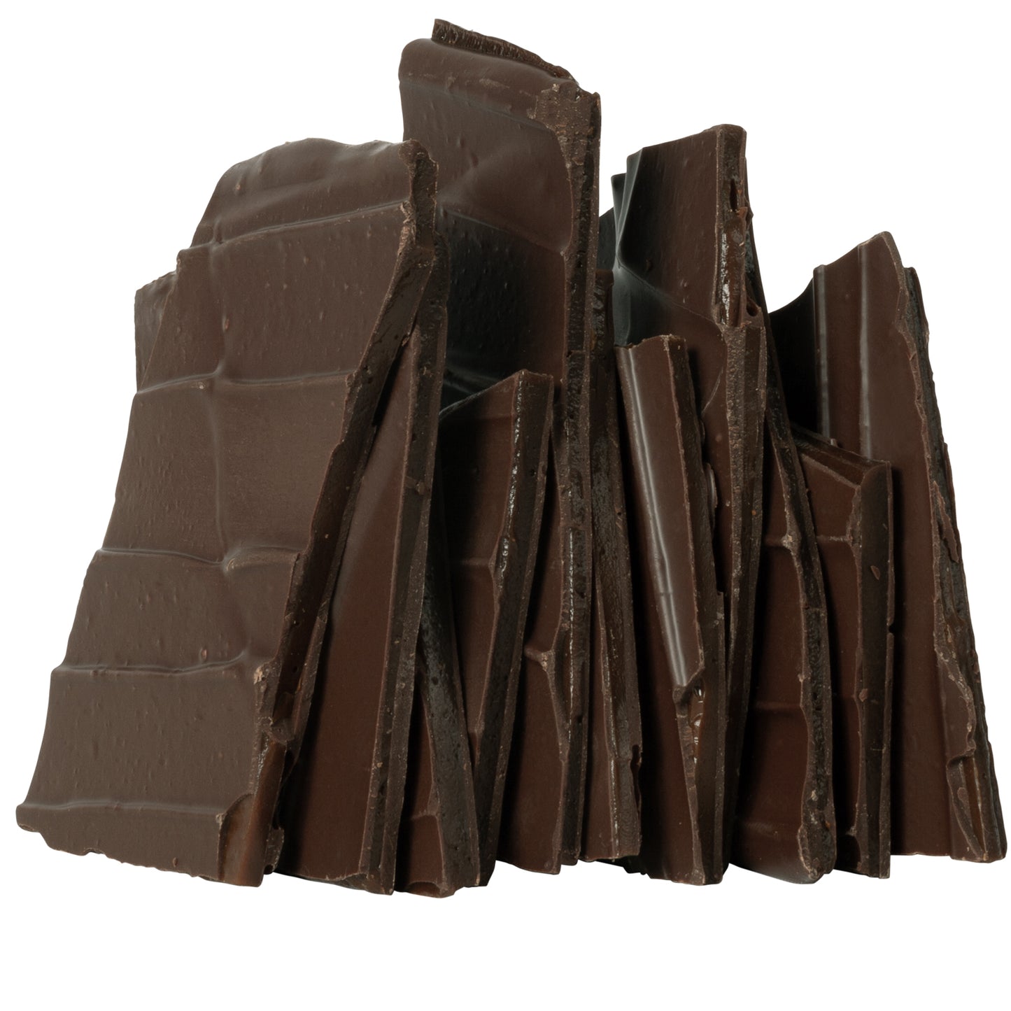 Close up of several pieces of chai latte brittle candy stacked