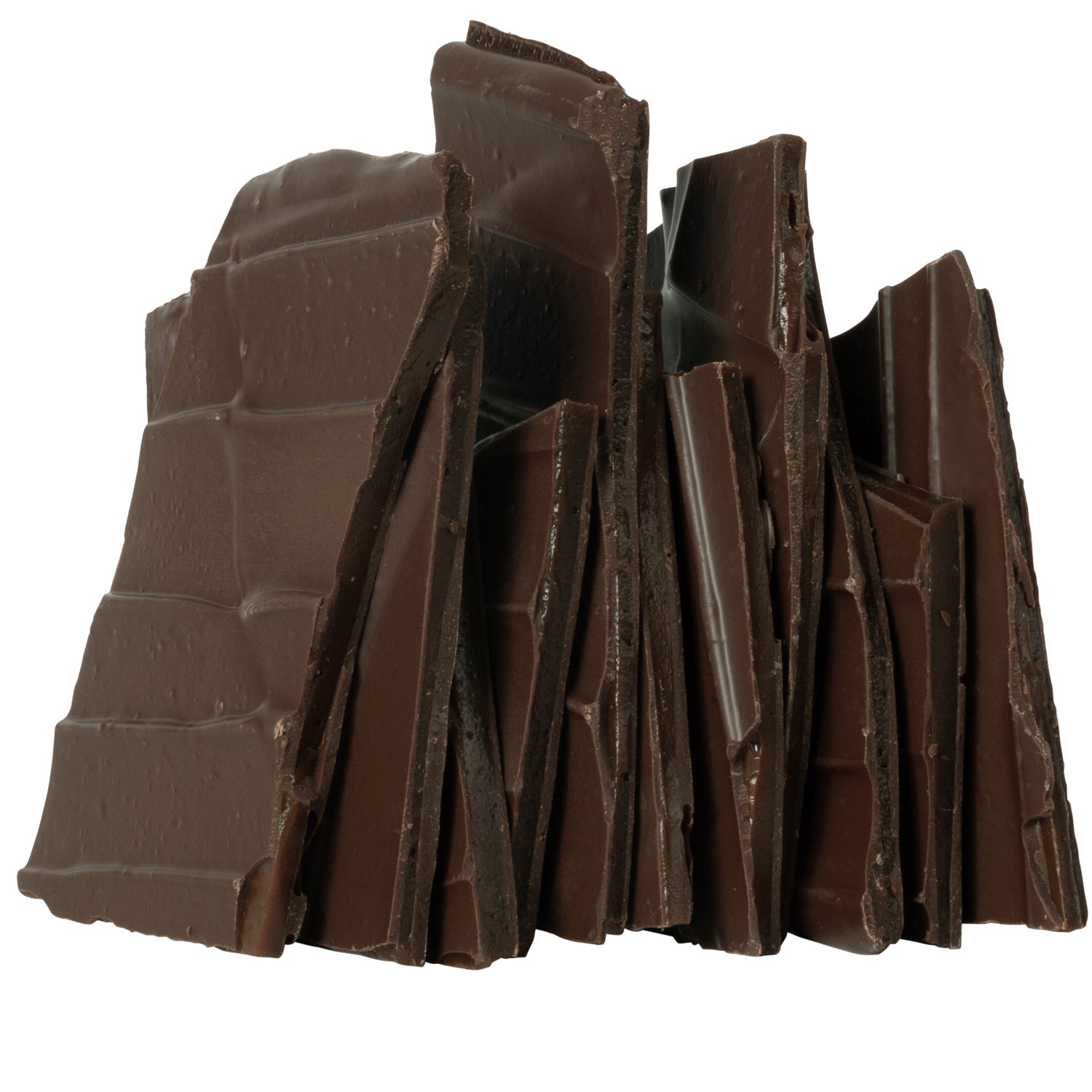 Close up of several pieces of chai latte brittle candy stacked